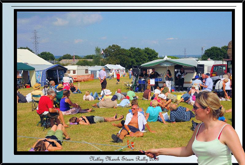 DSC_2506.jpg - Nikon D300 - People sunbathing on hot day and band playing with Horse trainer in foreground at Netley Marsh Steam Show July 2008