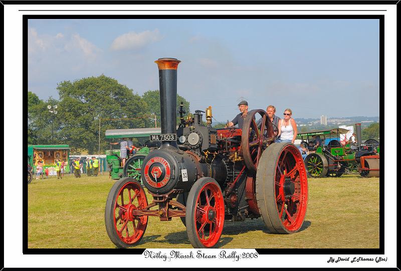 DSC_2612.jpg - Nikon D300 - Couple assisting with driving asteam engine around at Netley Marsh Steam Show July 2008