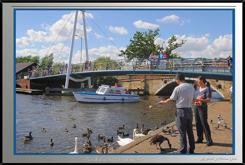 DSC_3835.jpg - Nikon D300 - Chinese couple feeding Wildfowl at the Wroxham Broad in Norfolk August 2008.