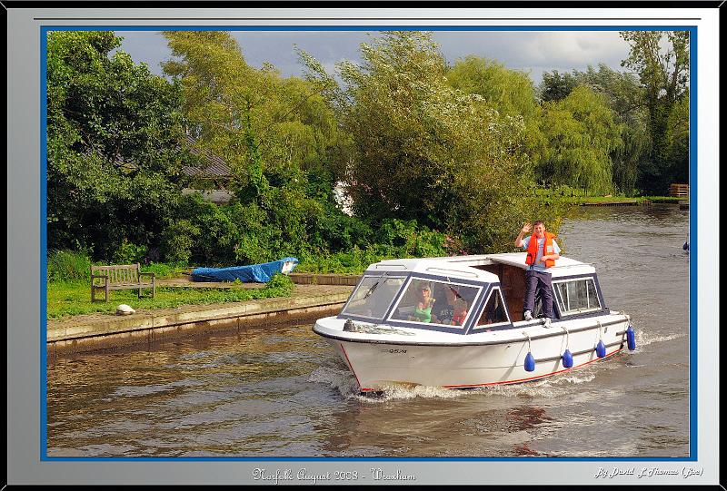 DSC_3893.jpg - Nikon D300 - young boy on boat heading towards Wroxham in Norfolk August 2008.